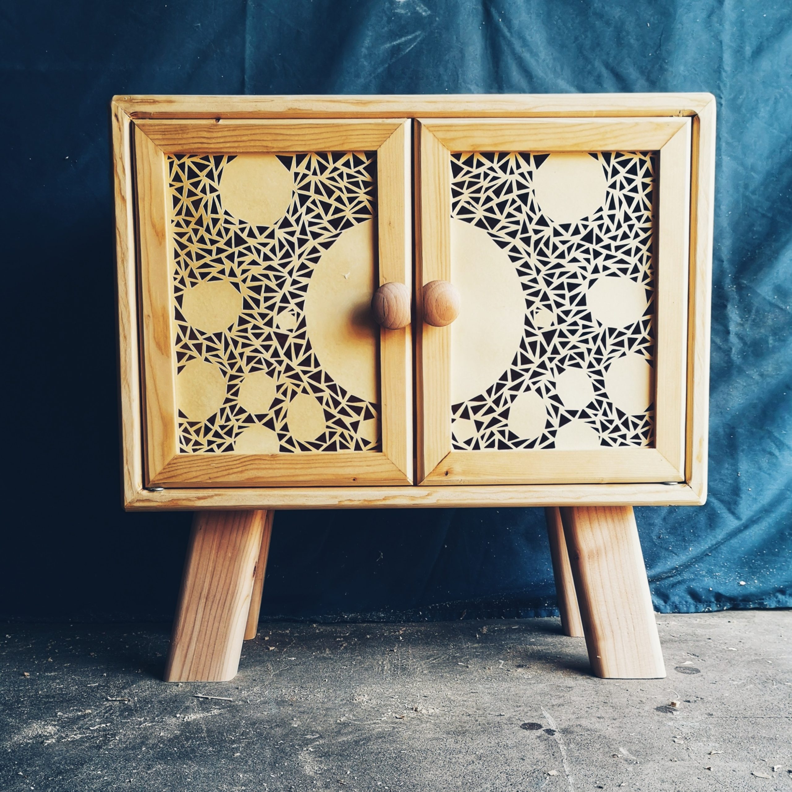 Cabinet with Hand-Cut Folder Paper Panels